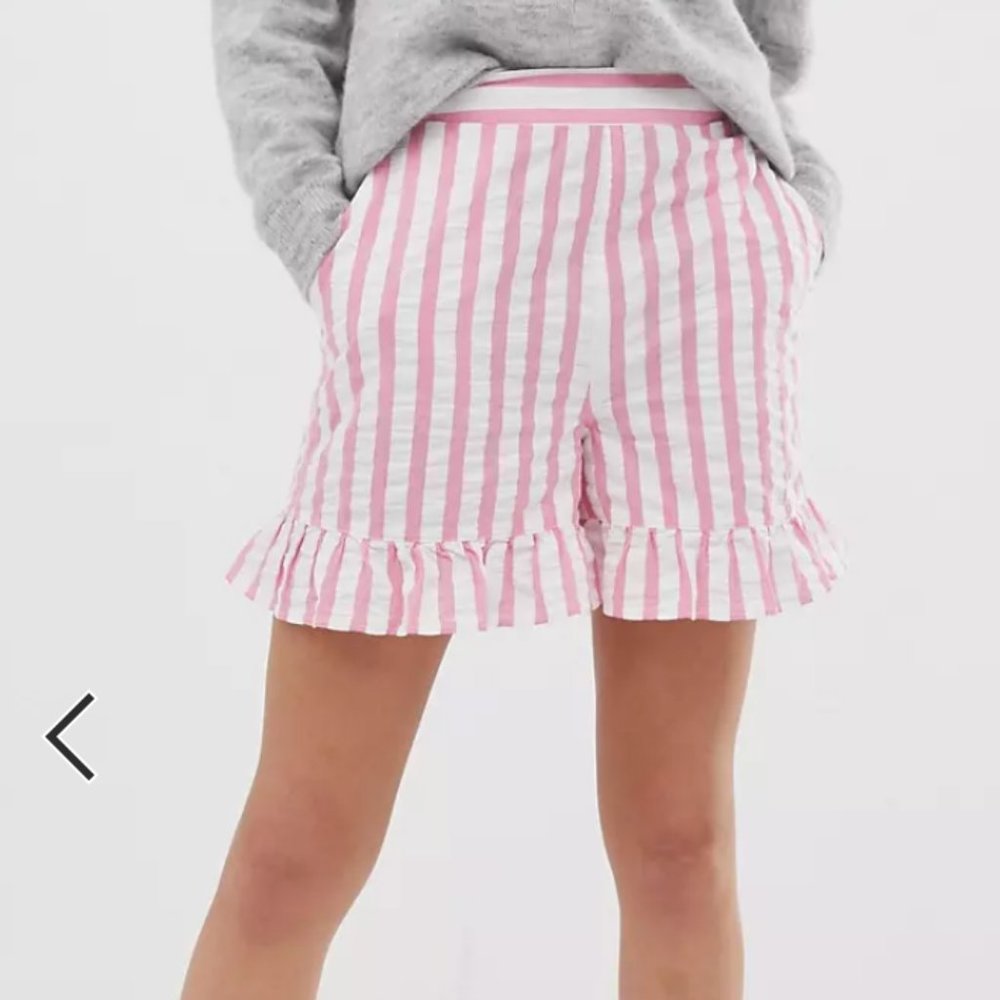 ASOS DESIGN pink stripe shorts with ruffle hem